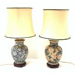 Two Oriental table lamps, each of bulbous form, the first example decorated with pink blossoming flo