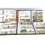 Six modern loose leaf albums containing over one thousand Edwardian and later postcards including r