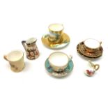 A selection of cabinet miniatures, comprising a Royal Crown Derby Imari pattern teacup, saucer, plat