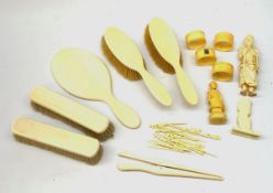 A selection of assorted ivory and bone items, to include a Japanese okimono modelled as a sage, four