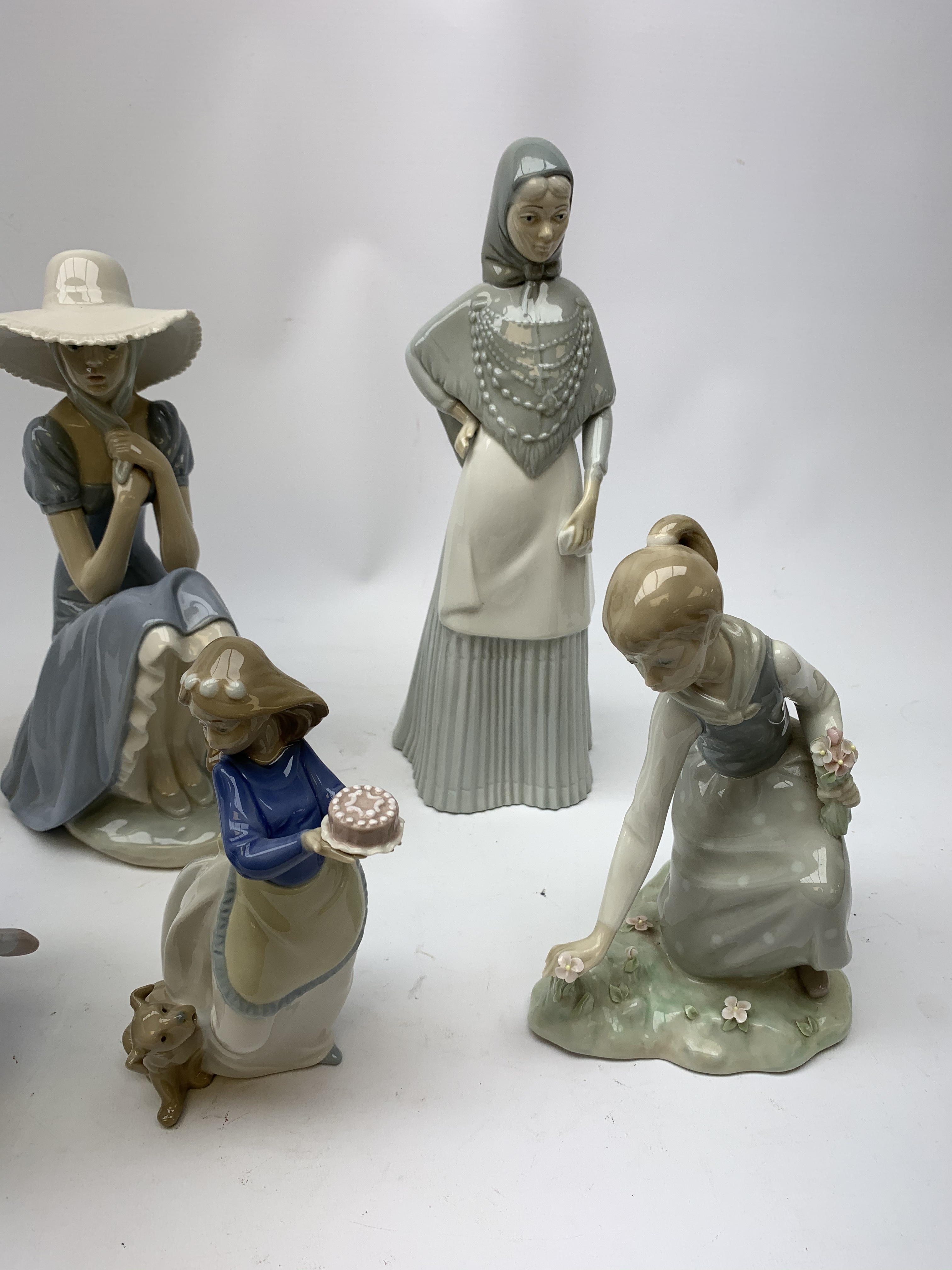 A group of Spanish figurines, to include examples bv Lladro and Nao. - Image 3 of 3