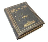 A Victorian photograph musical album, the tooled gilt leather bound album opening to reveal various