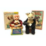 Two Japanese battery operated toys, comprising Pinic Bear, and Suzette the eating monkey, each in b