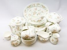 A selection of Wedgwood Cottage Ruse pattern dinner and teawares, comprising an oval serving platte