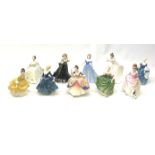 A group of Royal Doulton figurines, comprising Christine HN2792, Good Companion HN3608, Coralie HN2
