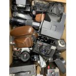 A large group of assorted cameras, to include an Ilford Sportsman 300, a Praktica Super TL2, a Koni