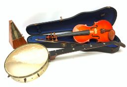 A cased Stentor Student violin and bow, together with a J E Dallas banjo with inlaid mother of pear