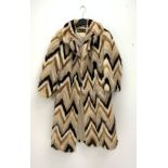 A lined mink chevron pattern fur coat.