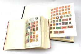 Two albums of world stamps, comprising The Cardinal Stamp Album, together with a further larger albu