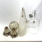 A collection of glass light fittings, to include a modern clear glass ceiling shade of barrel form,