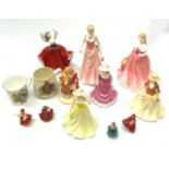 A collection of figurines, to include a selection of Royal Doulton fgurines, Autumn Stroll HN4588,
