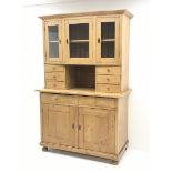 Early 20th century pine kitchen cupboard, raised glazed cabinets with drawers, lower section fitted