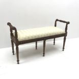 Regency style mahogany window bench seat, carved scrolled arms, six turned and fluted supports, W11