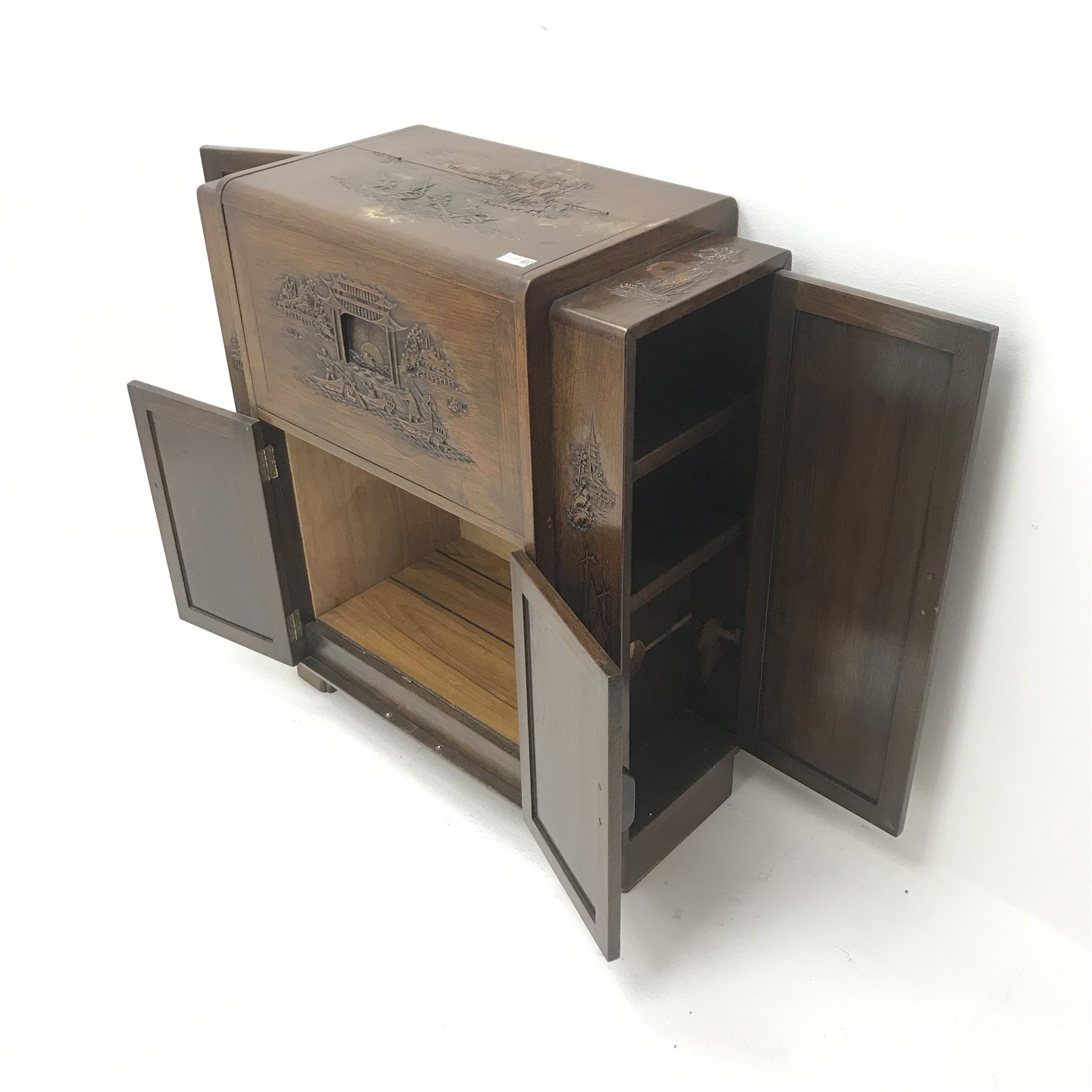 Eastern carved rosewood cocktail cabinet, double hinged lid enclosing mirrored back, four cupboard - Image 6 of 6