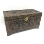 Eastern carved camphor wood blanket box depicting village scene, W94cm, H49cm, D45cm