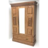 Late Victorian satin walnut wardrobe, projecting cornice, single mirrored door above drawer, plinth