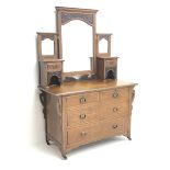 Early 20th century oak dressing chest, fitted with two short and two long drawers with Art Nouveau c