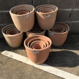 A quantity of approx. 24 mixed terracotta plant pots - various sizes