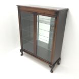 20th century mahogany display cabinet, two doors enclosing three adjustable shelves, cabriole feet,