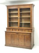 Edwardian oak glazed bookcase on cupboard fitted with drawers and collectors slides enclosed by two