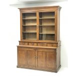 Edwardian oak glazed bookcase on cupboard fitted with drawers and collectors slides enclosed by two