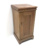 Victorian fruitwood bedside cabinet, hinged top enclosing porcelain wash bowl, above single cupboar