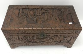 Eastern carved camphor wood blanket box depicting harbour scene, W95cm, H49cm, D46cm