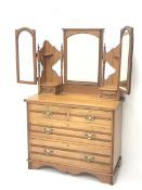 Edwardian satin walnut dressing chest, triple bevelled mirror back with two trinket drawers, the ch