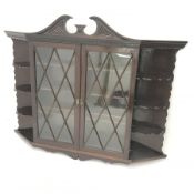 Early 20th century wall hanging display cabinet, swan neck pediment, two door enclosing three shelv