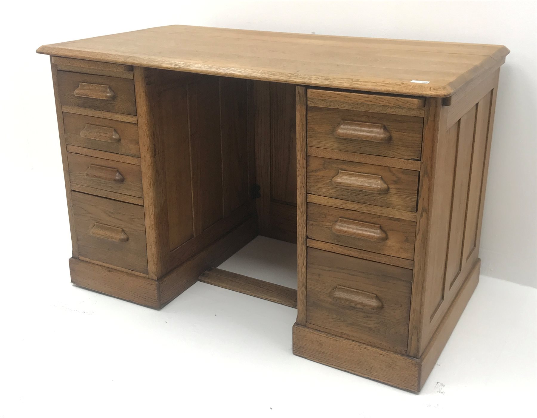 Vintage oak twin pedestal desk, two slides, eight drawers, plinth base, W122cm, H78cm, D68cm