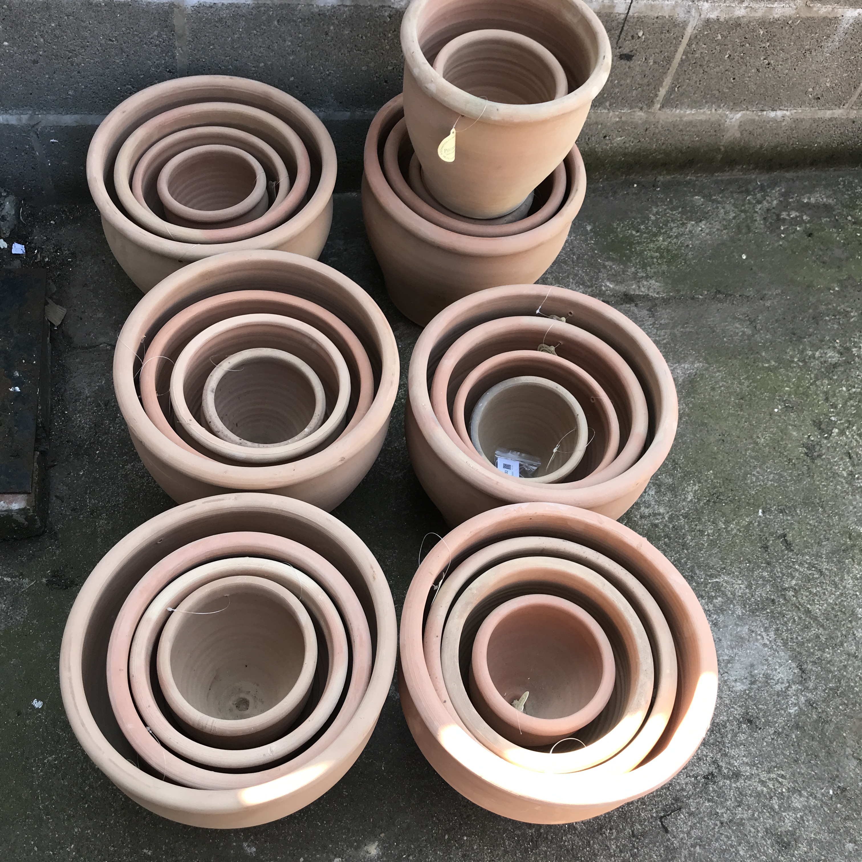 A quantity of approx. twenty four tapering terracotta pots - various sizes - Image 2 of 2