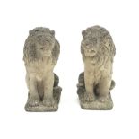 Pair weathered composite stone seated lions H65cm