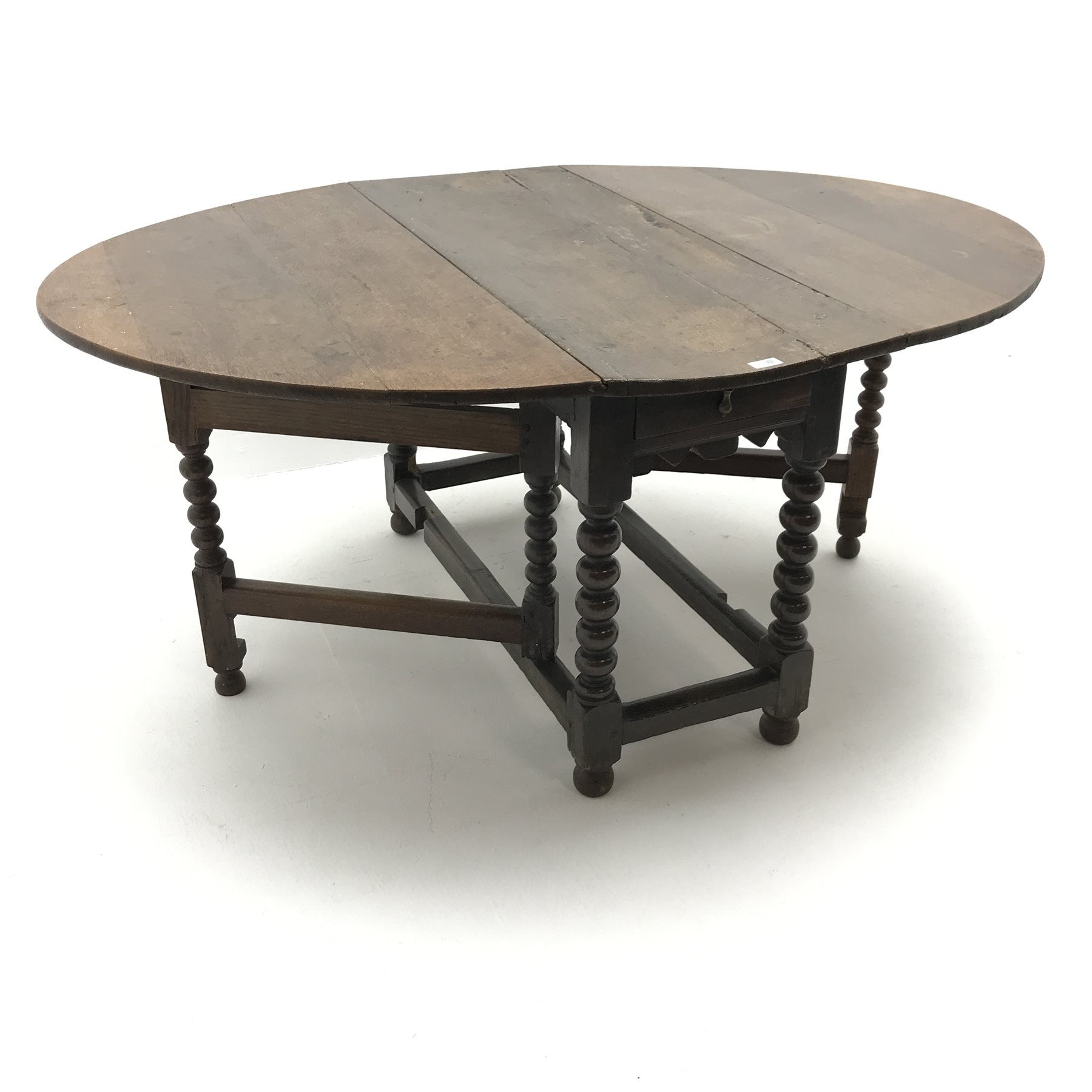 18th century oval oak drop leaf table, bobbin supports, gate leg action, W162cm72cm, D119cm