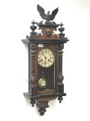 Late 19th century walnut cased Vienna style wall clock, with eagle and final pediment, twin train '