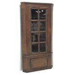 19th century stained pine barrel back corner cupboard, moulded cornice, astragal glazed door enclosi