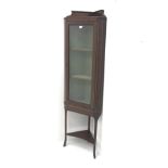 Edwardian inlaid mahogany corner display cabinet, raised shaped back, single glazed doors enclosing