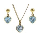 18ct gold blue topaz heart shaped pendant on 9ct gold chain and matching 18ct gold blue topaz earrin