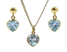 18ct gold blue topaz heart shaped pendant on 9ct gold chain and matching 18ct gold blue topaz earrin