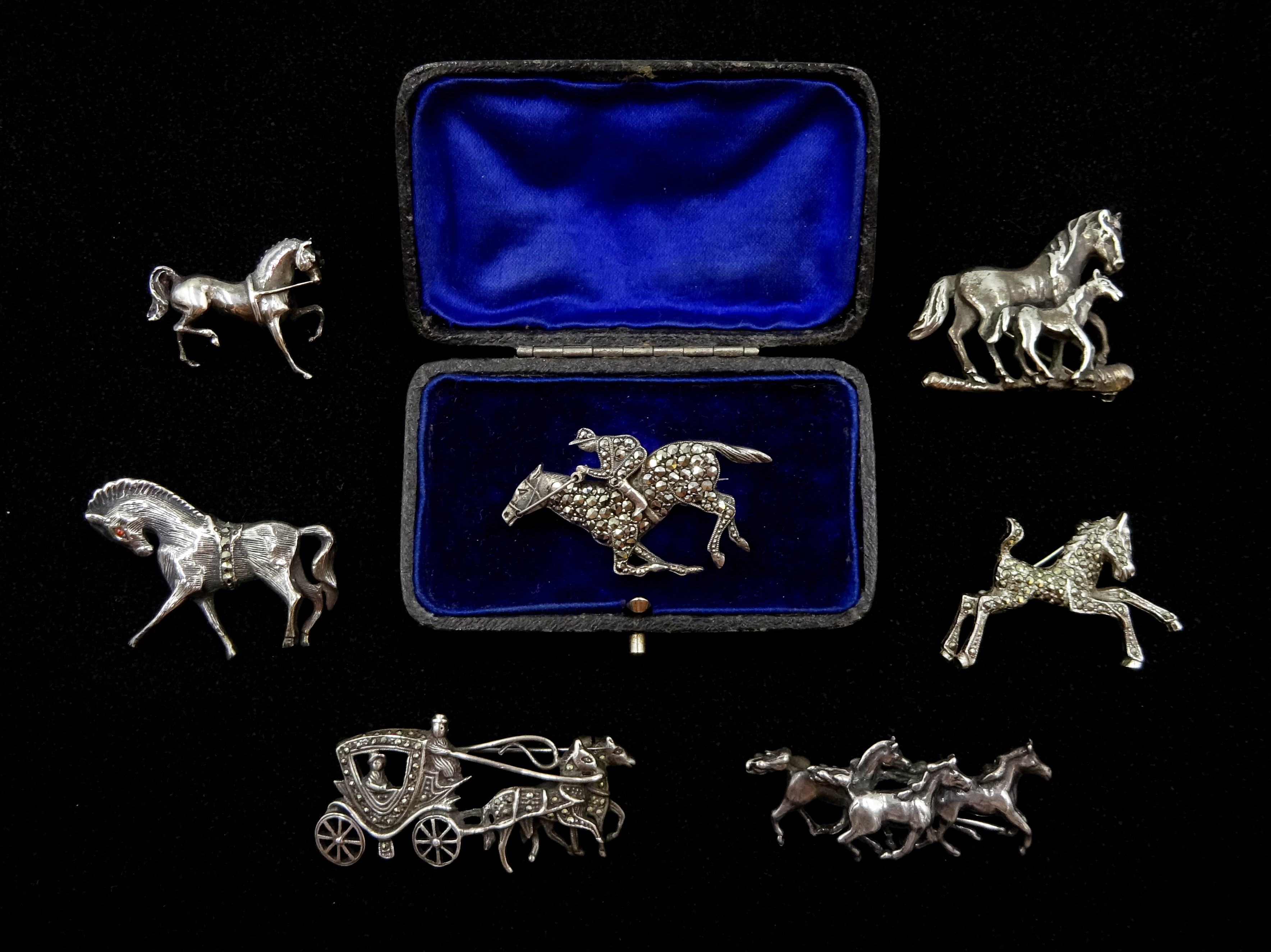 Silver and marcasite racehorse brooch, silver trotting horse makers mark HG, London 1995, four other