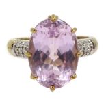 9ct gold oval kunzite ring with diamond set shoulders and gallery, hallmarked