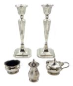 Silver three piece cruet set by Zachariah Barraclough & Sons, Chester 1926 and pair of silver weight