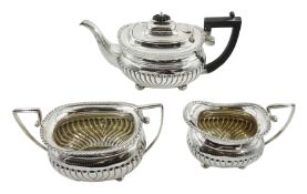 Victorian silver three piece tea service, on four bun feet by George Nathan & Ridley Hayes, Chester