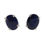 Pair of silver oval sapphire stud earrings, stamped 925