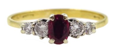 18ct gold graduating ruby and diamond five stone ring, hallmarked
