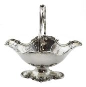 Edwardian silver pedestal bon bon dish, with swing handle by Williams (Birmingham) Limited, 1905 app
