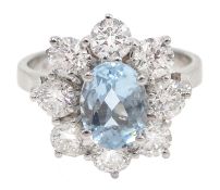 18ct white gold aquamarine and diamond flower cluster ring, hallmarked, aquamarine approx 1.30 carat