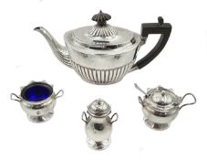 Victorian silver bachelor's teapot, London 1889, silver three piece cruet set, Birmingham 1911 and a