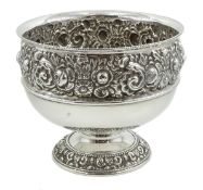 Victorian silver pedestal bowl, embossed floral decoration by Walker & Hall, Sheffield 1899, approx