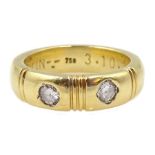 18ct gold two stone round brilliant cut diamond ring, rubover set, stamped 750