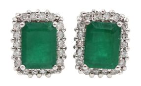 Pair of 18ct emerald and diamond cluster stud earrings, hallmarked